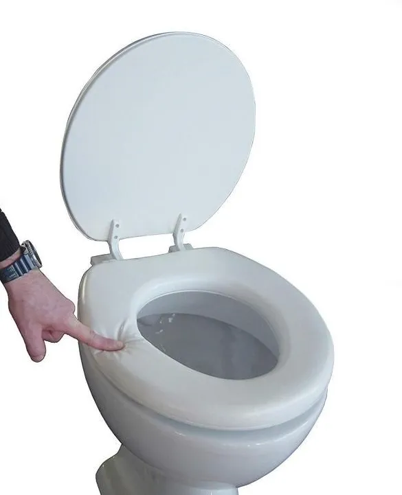Soft toilet seat with a flap