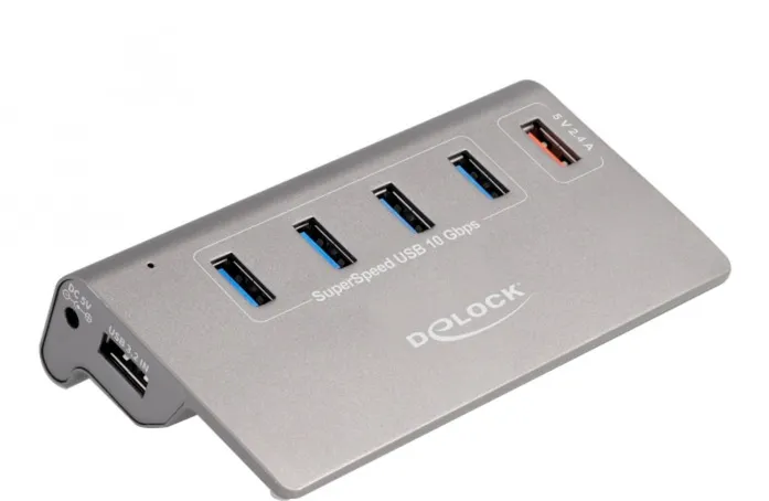 DeLOCK USB 10 Gbps hub with 4 USB Type-A ports + 1 quick charging port, USB hub (grey, incl. power supply)